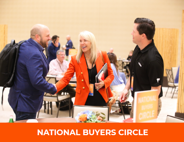People talking at a table at NBC