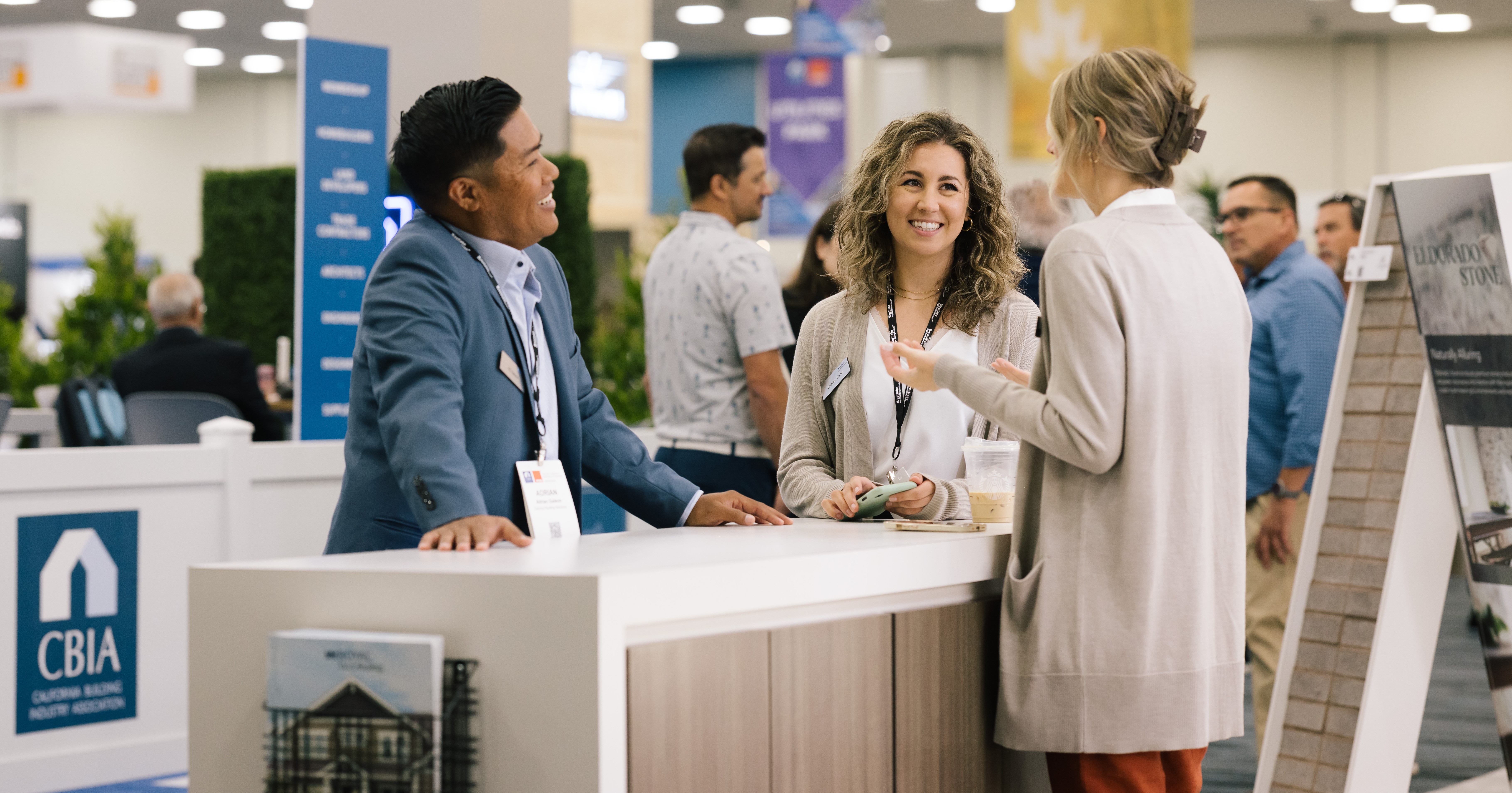 Attendees Networking at PCBC, CBIA Booth