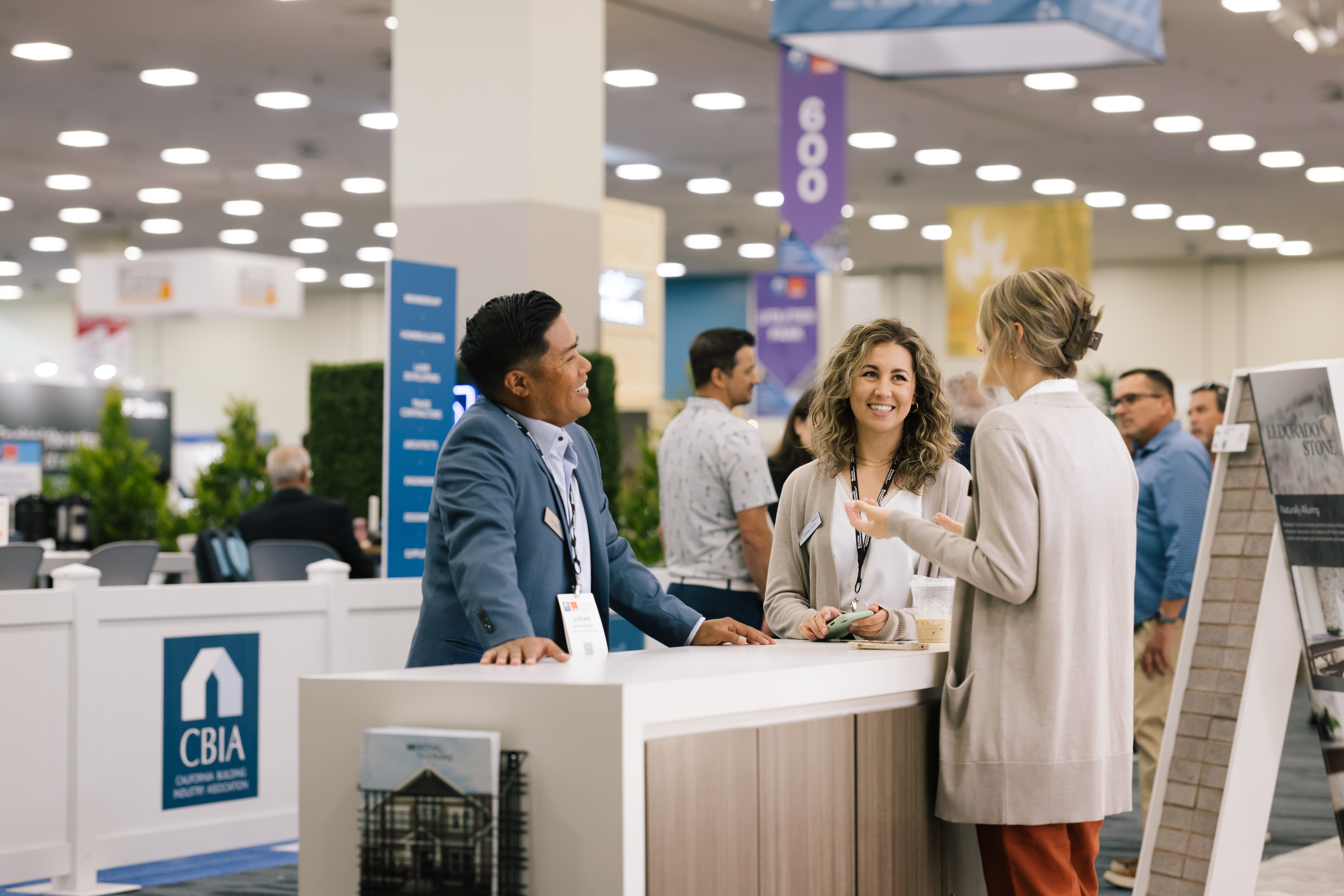 Attendees Networking at PCBC, CBIA Booth